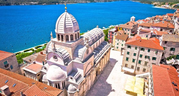 Photo of Sibenik saint James cathedral and waterfront aerial view, Croatia.