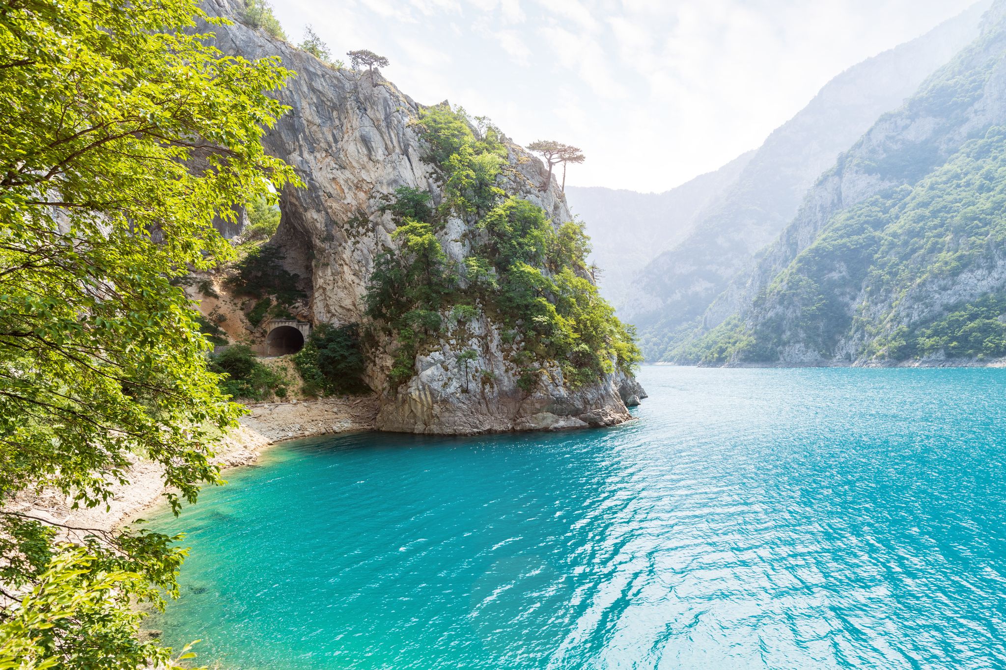 Photo of National park of famous Lake Piva in Montenegro in the morning.
