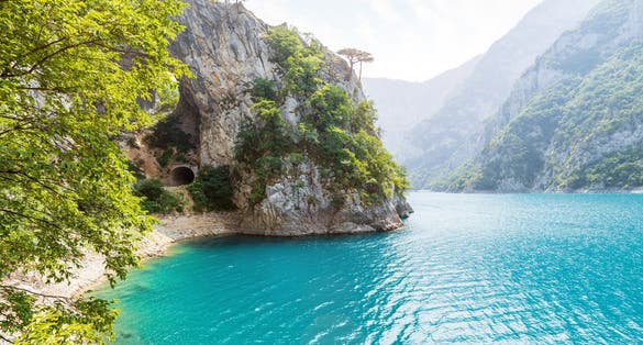Photo of National park of famous Lake Piva in Montenegro in the morning.