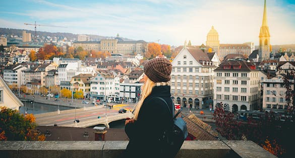 Photo of tourist girl enjoying her travel in Zurich, Switzerland.