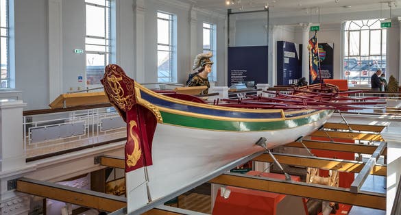 The royal barge which took Lord Nelson's coffin from Greenwich to St Paul's Cathedral on display in Portsmouth Dockyard, Hampshire, UK.