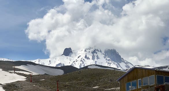 photo of panoramic view on ski resort in spring. Mount Erciyes in Turkey.