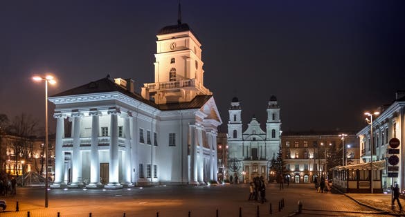 White Building Old City Hall In Minsk, Belarus. Night View