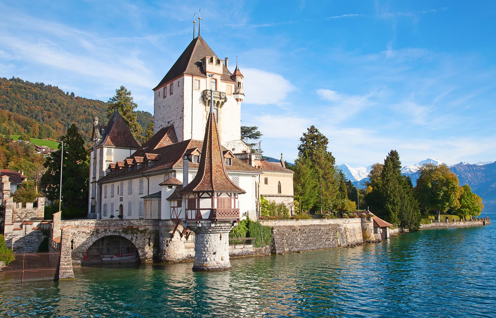 Photo of Oberhofen castle on the lake Thun, Switzerland .