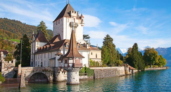 Photo of Oberhofen castle on the lake Thun, Switzerland .