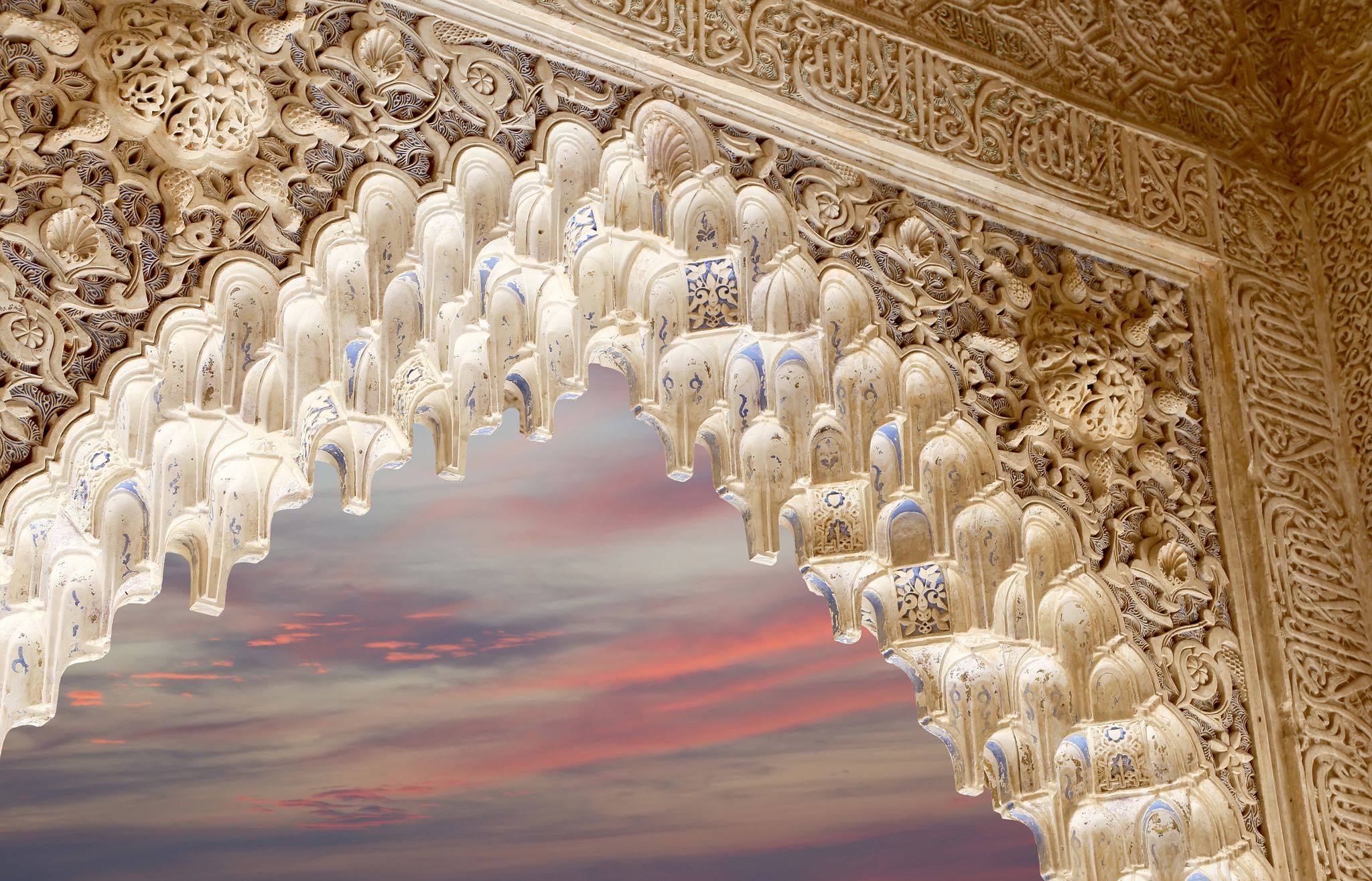 Photo of Arches in Islamic (Moorish) style in Alhambra, Granada, Spain .
