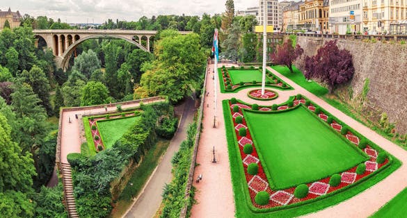 Photo of panoramic city view of Luxembourg city with the famous Adolphe bridge and Constitution square.