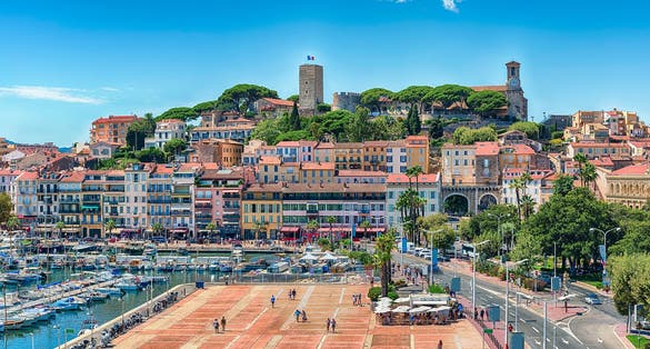 Aerial view over the Vieux Port (Old Harbor) and Le Suquet district in Cannes, Cote d'Azur, France.