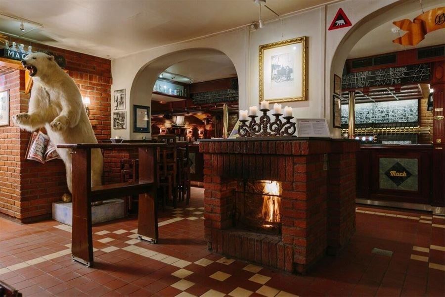 TROMSO, ARCTIC CIRCLE - NORWAY - Tromso is a city in Tromso Municipality in Troms og Finnmark county, Norway. op Very popular pub Olhallen (brewery Mack)