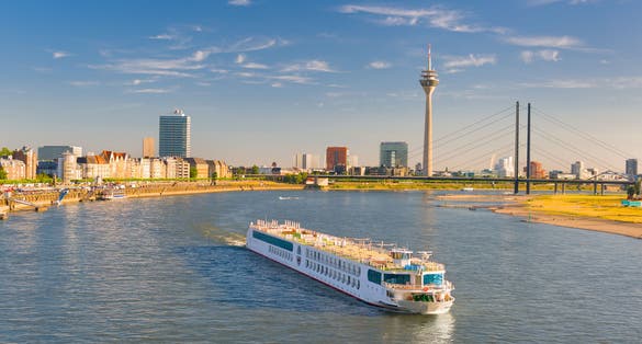 photo of view of Cityscape of Dusseldorf over the Rhine river in a sunny summer day, Düsseldorf, Germany.