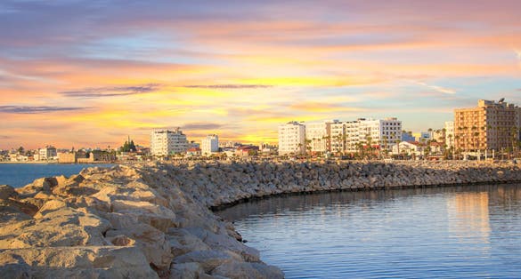Photo of beautiful view of the main street of Larnaca and Phinikoudes beach in Cyprus.