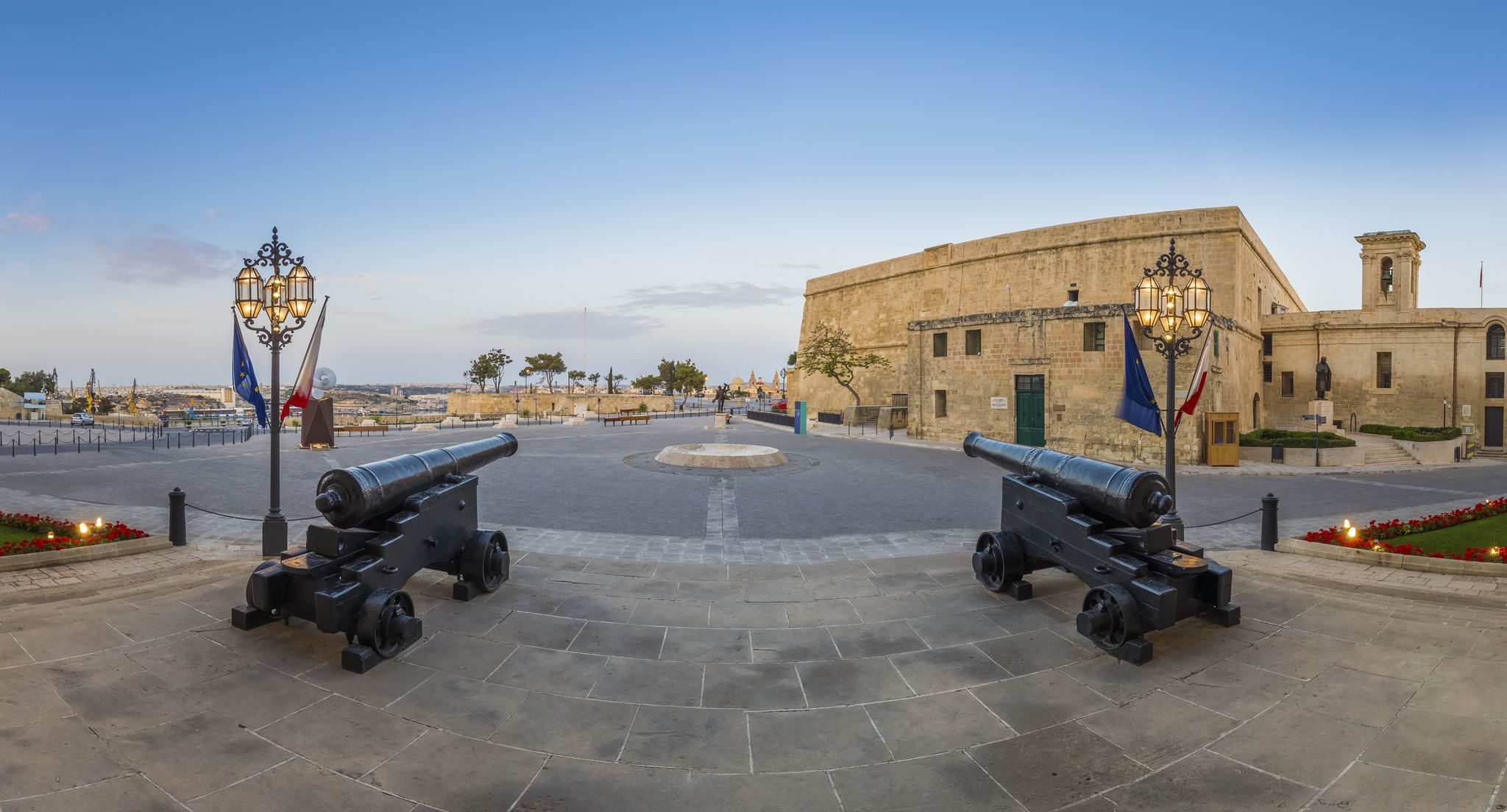 Panoramic shot of the cannons at the entrance of Auberge de Castille, Valletta, Malta