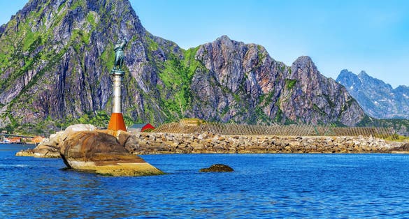 Photo of Svolvaer harbour with Statue of the Fisherman's wife in the Lofoten Islands