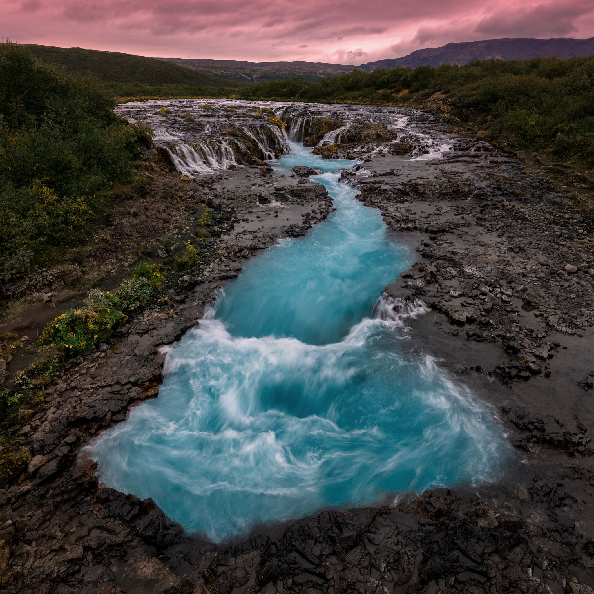 photo of aerial view of the Icelandic waterfall Brúarfoss.