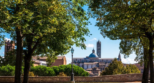 photo of Siena Tuscany on the walls of Fortezza Medicea in the historic city centre .