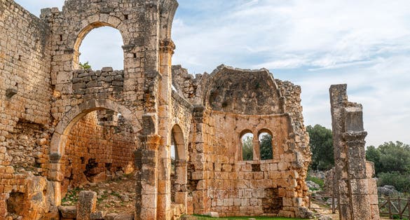 Photo of amazing views from Kanlıdivane (ancient Canytelis), which is an ancient city situated around a big sinkhole in Mersin, Turkey.