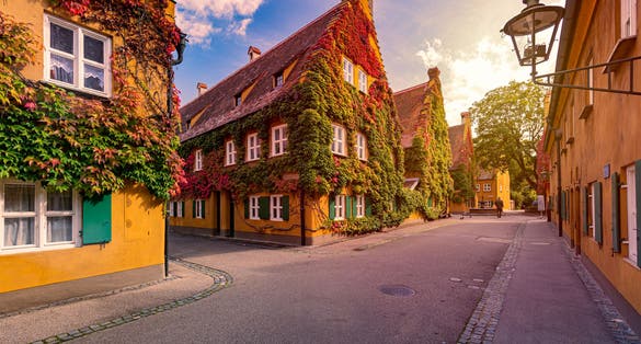 photo of view of The Fuggerei is the world's oldest social housing complex still in use. It is a walled enclave within the city of Augsburg, Bavaria, Germany