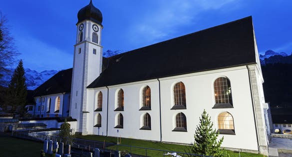 photo of night view of Engelberg Abbey (Kloster Engelberg) in Switzerland.