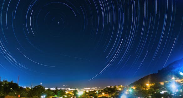 Star trails above the city of Niš