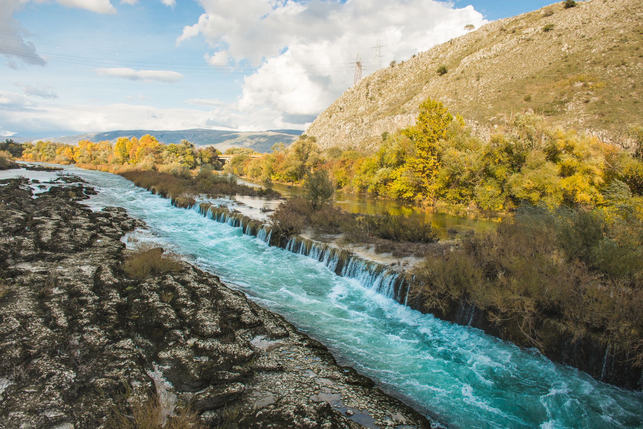 Photo of aerial view of the old bridge and river in city of Mostar, Bosnia and Herzegovina.