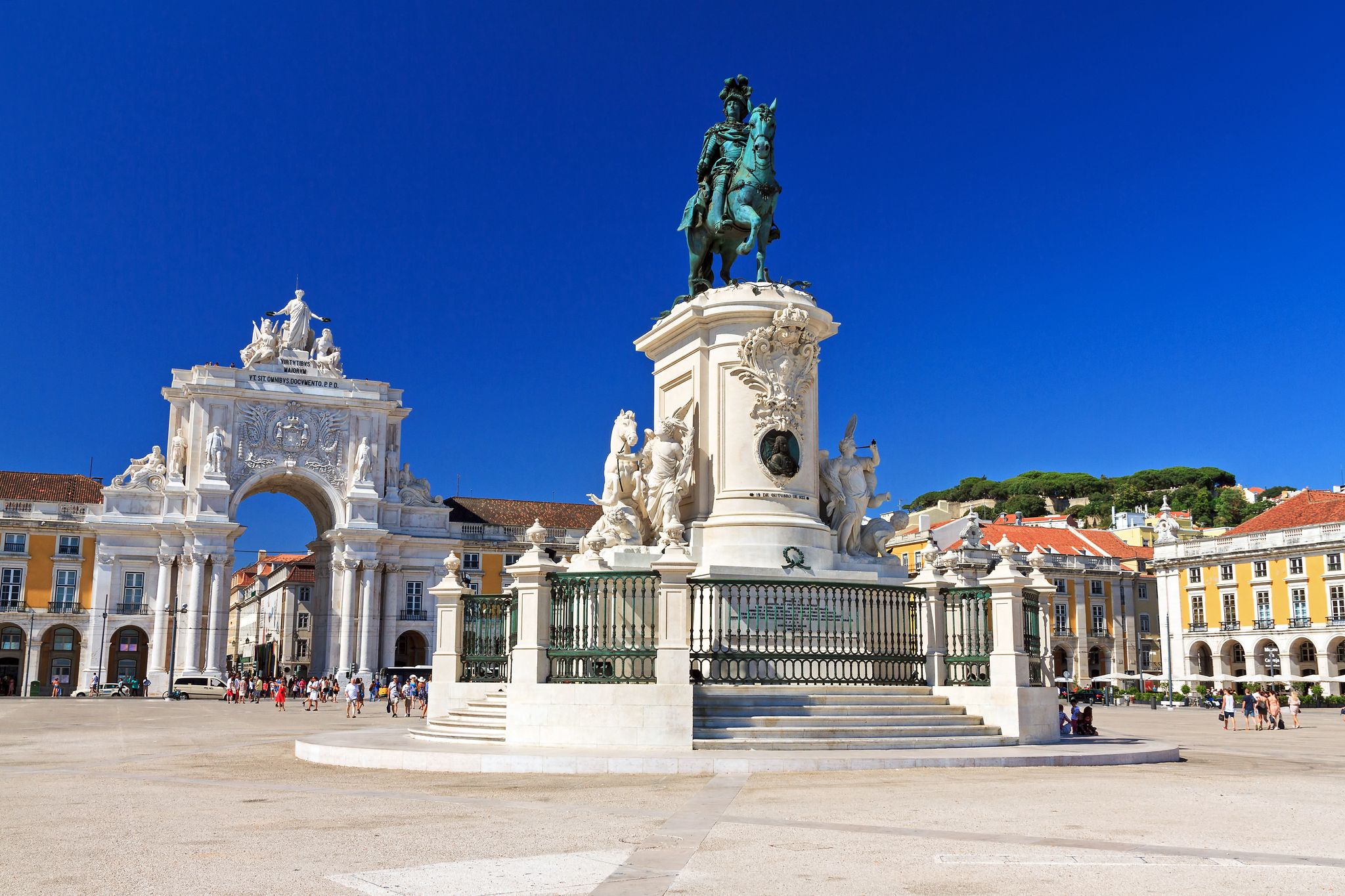 Photo of beautiful view of the gate and statue of King Jose on the Commerce square (Praca do Comercio) in Lisbon, Portugal.