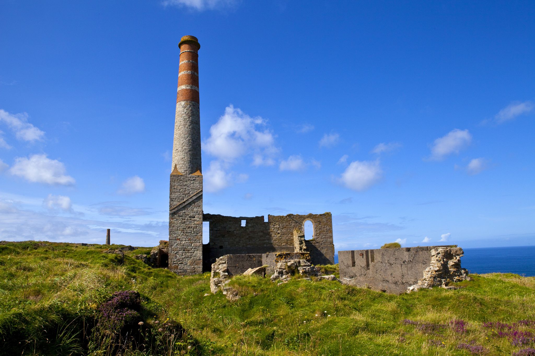 Photo of remains of the old Engine house chimneys at Levant Tin Mine - located very close to Geevor Tin Mine in Cornwall, England.
