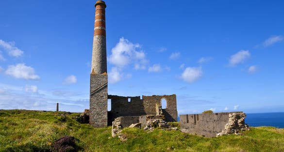 Photo of remains of the old Engine house chimneys at Levant Tin Mine - located very close to Geevor Tin Mine in Cornwall, England.