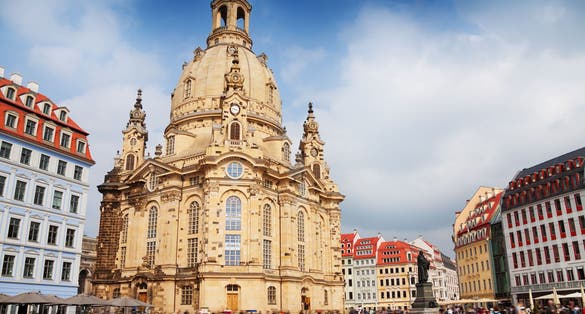Photo of famous church of Our Lady during the sunrise in Dresden city, Germany.