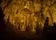 Illuminated lit lights stalagmites stalactites limestone show cave cavern Grutas da Moeda in Batalha Leiria Portugal