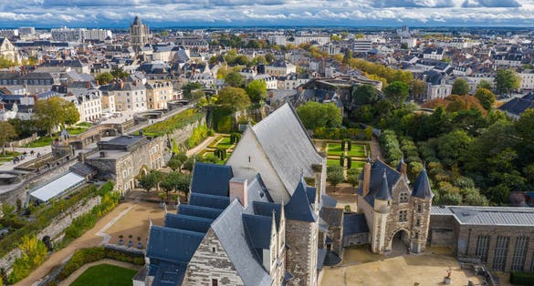 Photo of Aerial panoramic view of the famous Angers castle (Château d'Angers) 13th century, cathedral, and medieval quarters in the Loire Valley, Western France.