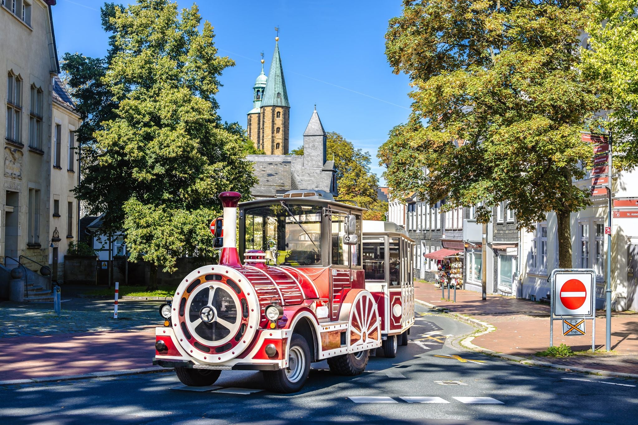 Photo of small sightseeing train in Goslar on a sunny Day, Germany.