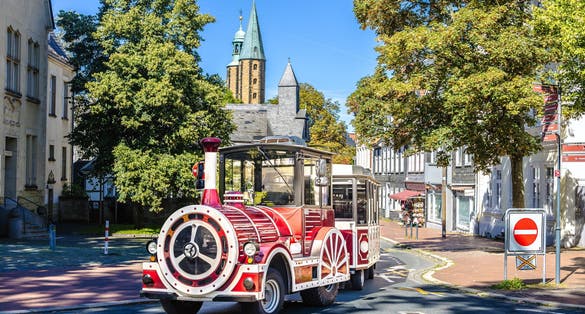 Photo of small sightseeing train in Goslar on a sunny Day, Germany.