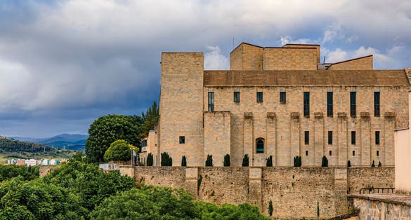 photo of Royal and General Archive of Navarra surrounded by medieval city walls in old town Pamplona, Navarra, Spain.