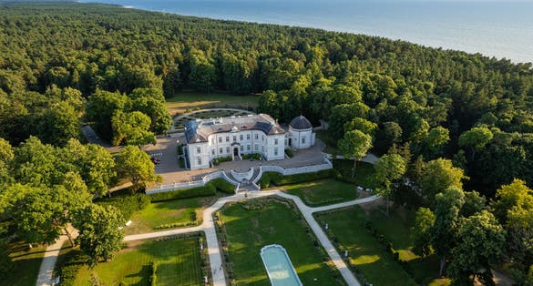 Aerial summer sunset view of historic palace in Palanga, Lithuania.