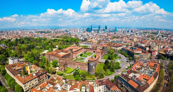 Photo of Sforza Castle or Castello Sforzesco aerial panoramic view. Sforza Castle is located in Milan city in northern Italy.