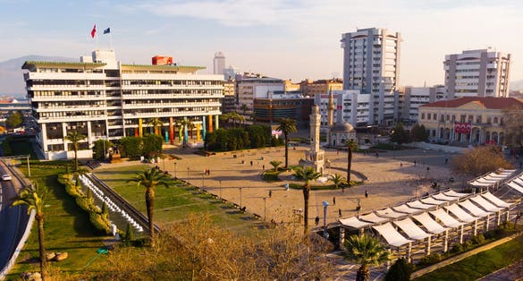 photo of general aerial view of Konak Square with Izmir Clock Tower and Yali Mosque on sunny winter day, Izmir, Turkey.