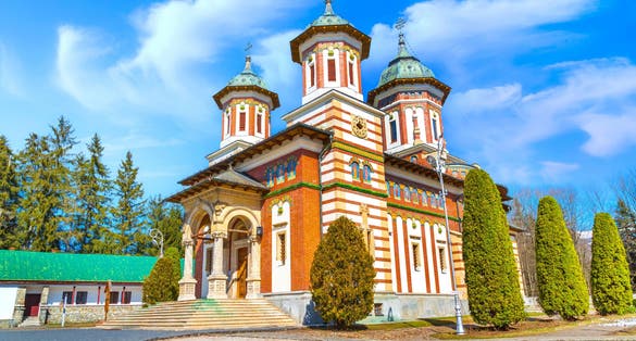 Photo of Sinaia Monastery on Prahova Valley, Carpathian Mountains, Romania.