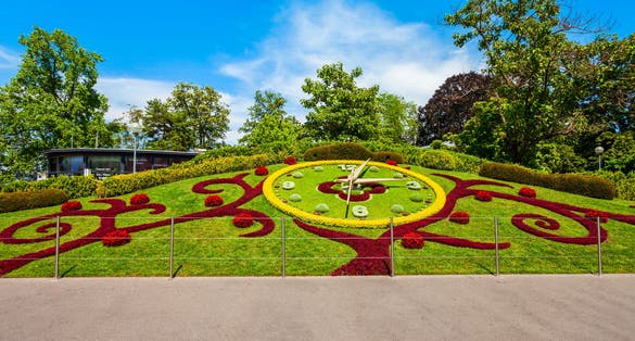 Photo of flower clock or L'horloge fleurie is a symbol of the city watchmakers, located in Jardin Anglais park in Geneva city in Switzerland.