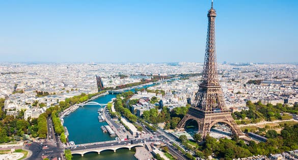 Photo of Eiffel Tower or Tour Eiffel aerial view, is a wrought iron lattice tower on the Champ de Mars in Paris, France.