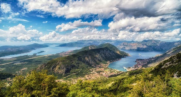 Photo of Bay of Kotor with beautiful mountains, Adriatic sea and town Kotor in Montenegro.