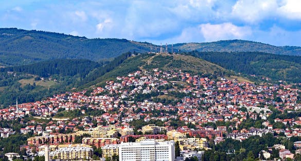 Photo of panoramic view from Avaz Twist Tower over Sarajevo in summer in Bosnia and Herzegovina.