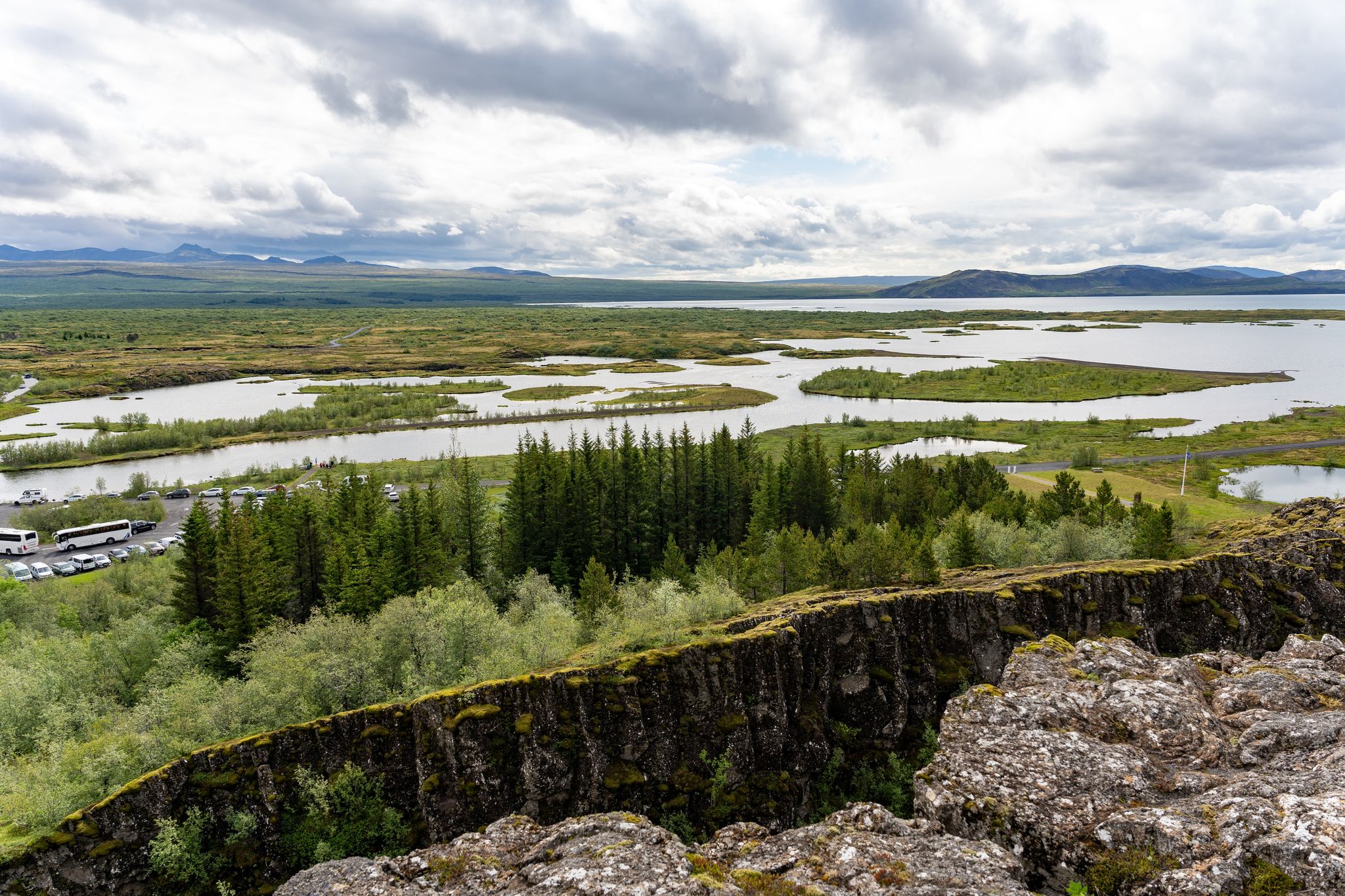 photo of Landscape of Thingvellir rift valley of the mid Atlantic ridge and Lake Thingvallavatn in Iceland .