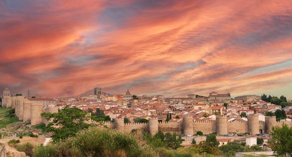 photo of view of panoramic view of the city of Avila at sunset, Spain.