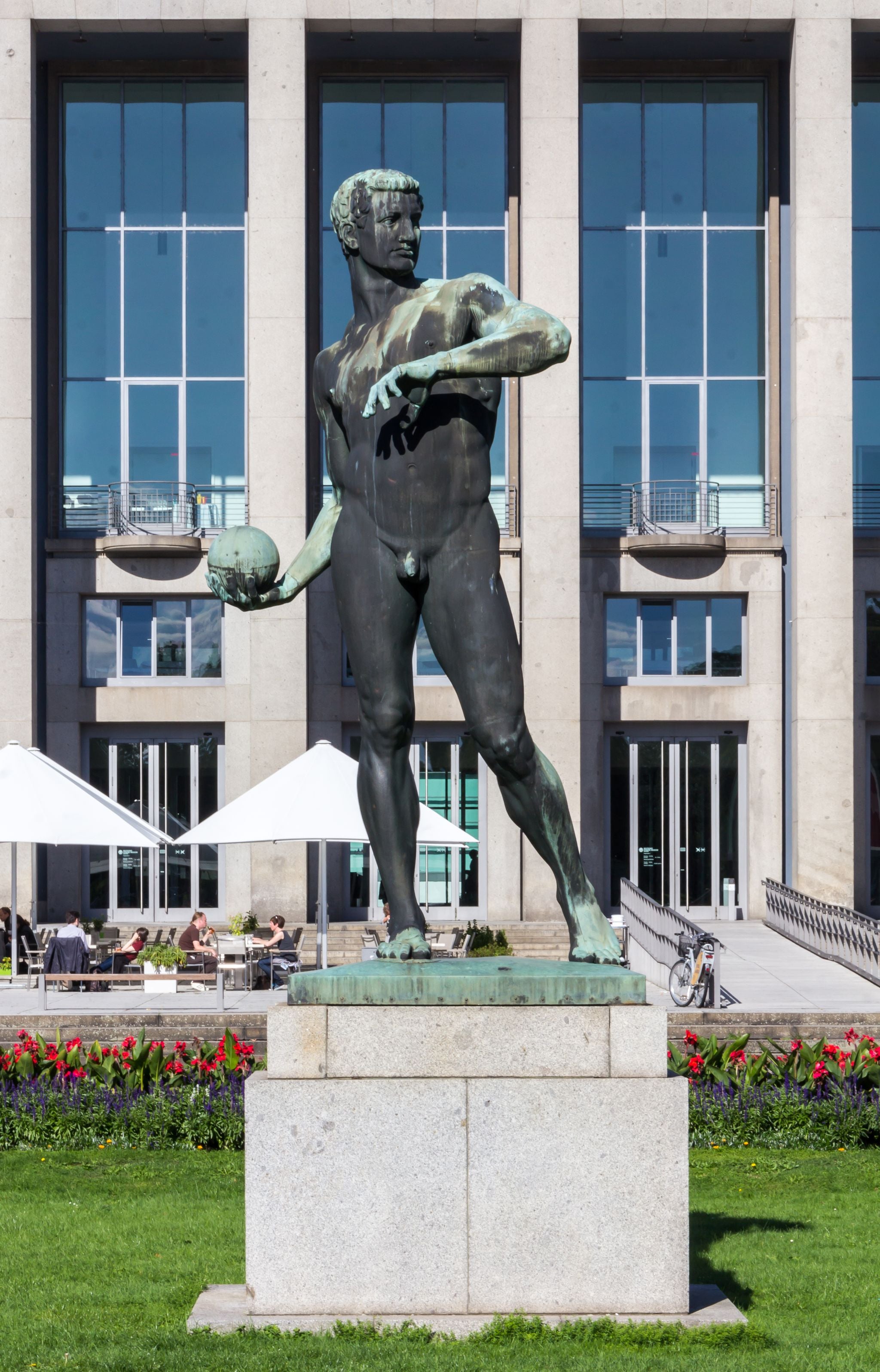 German Hygiene Museum in Dresden with sculpture ball thrower by Richard Daniel Fabricius.