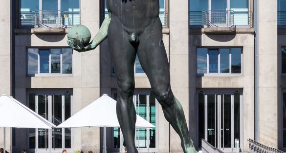 German Hygiene Museum in Dresden with sculpture ball thrower by Richard Daniel Fabricius.