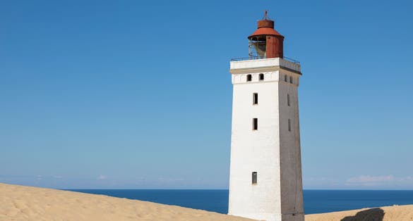 Photo of Rubjerg Knude Fyr, lighthouse on the dune near Lønstrup, Denmark.