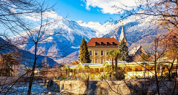 MERANO,ITALY -  Merano o Meran is a city and comune in South Tyrol, northern Italy. Generally best known for its spa resorts. Passer River, Alps mountains in winter time.