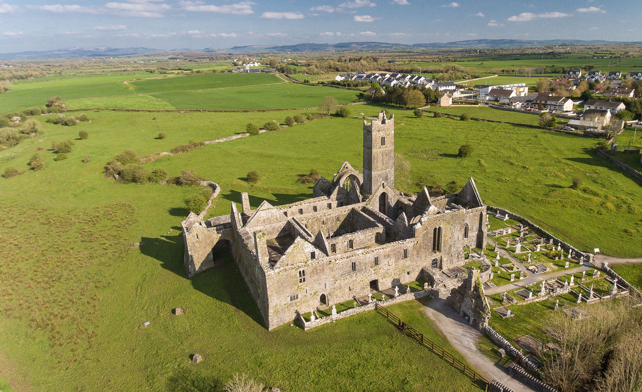 photo of Aerial view of an Irish public free tourist landmark, Quin Abbey, County clare, Ireland.