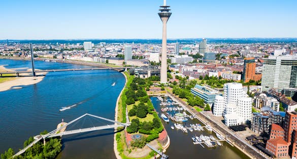 photo of view of Rheinturm and Media Harbour district in Dusseldorf city in Germany