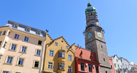 photo of view of The Stadtturm and Cityscape of Innsbruck in Austria.
